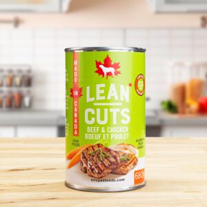 A can of Lean Cuts ground beef with a green label on a kitchen counter.